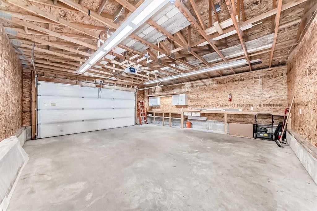 3042 31A Street Se, Calgary, AB - Indoor Photo Showing Garage