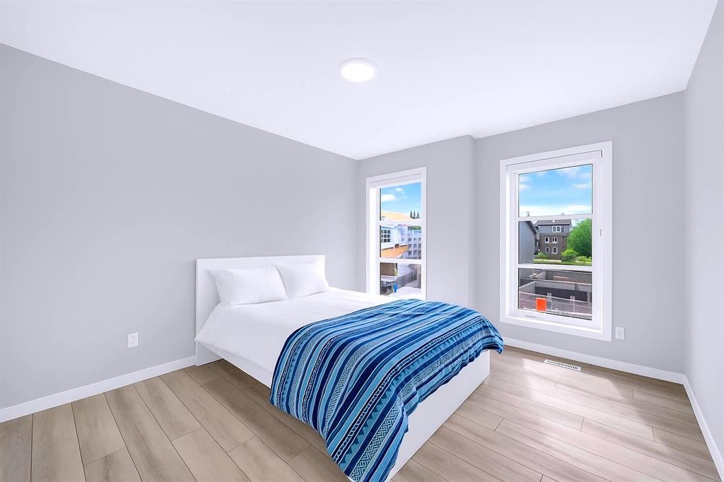154 Silver Spruce Grove Sw, Calgary, AB - Indoor Photo Showing Bedroom