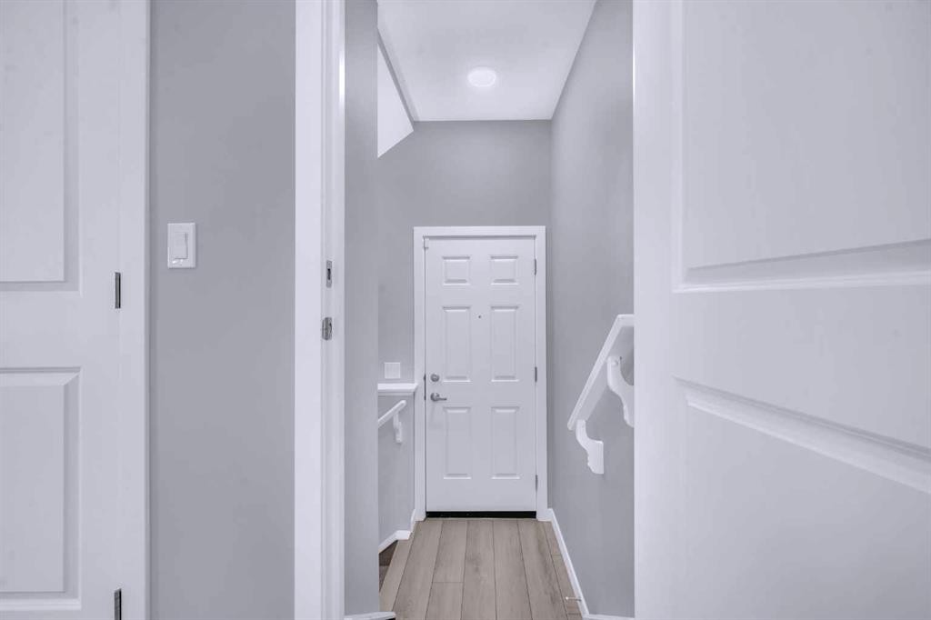 154 Silver Spruce Grove Sw, Calgary, AB - Indoor Photo Showing Other Room