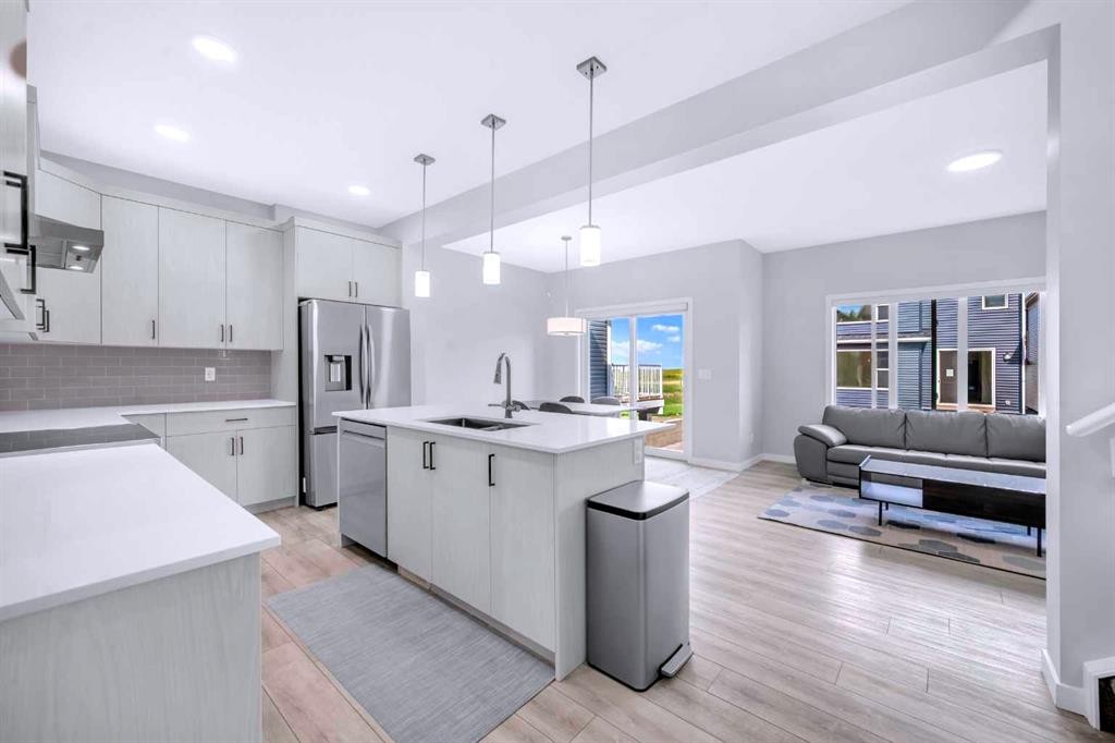 154 Silver Spruce Grove Sw, Calgary, AB - Indoor Photo Showing Kitchen With Stainless Steel Kitchen With Upgraded Kitchen