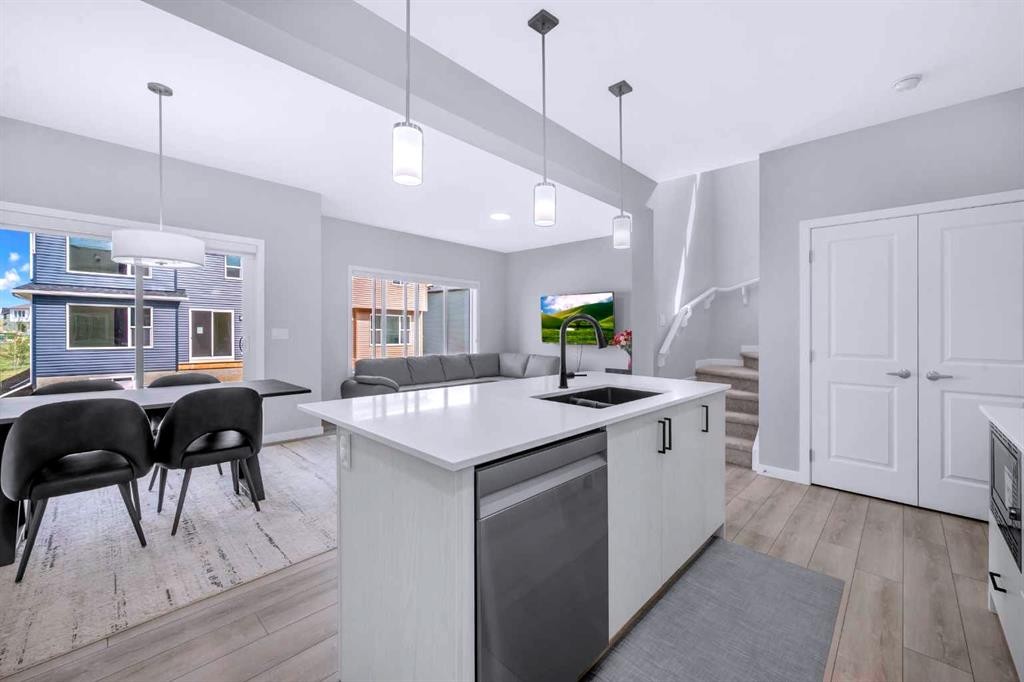 154 Silver Spruce Grove Sw, Calgary, AB - Indoor Photo Showing Kitchen With Double Sink