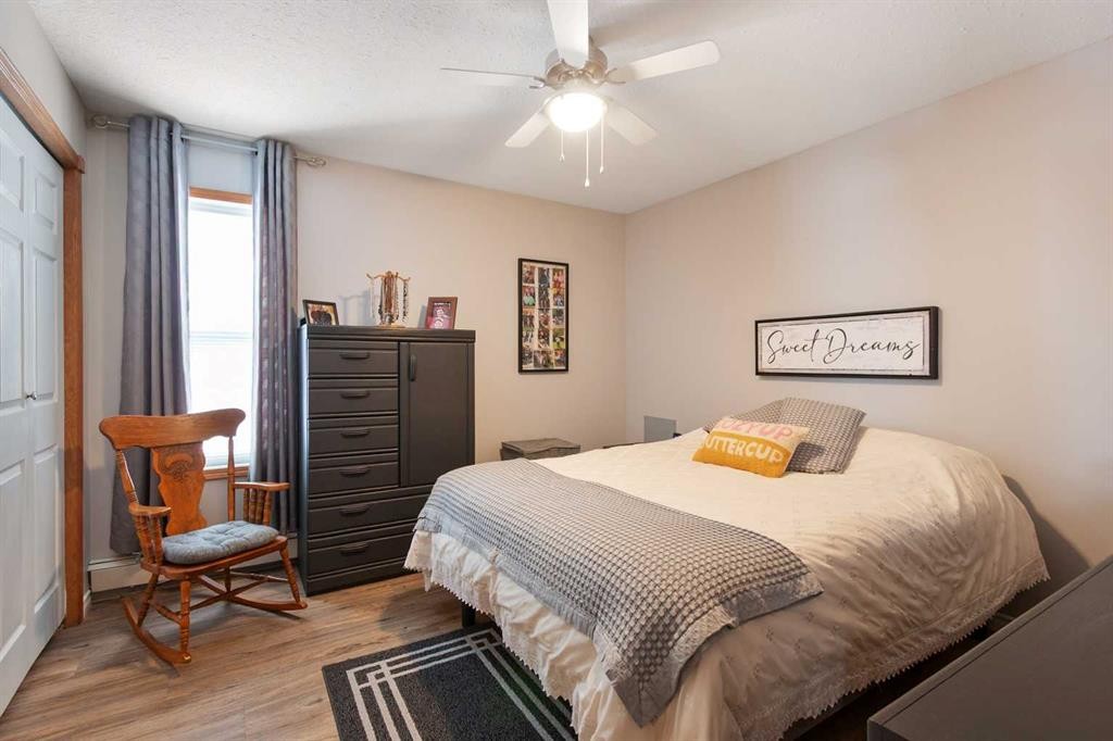 202-5026 49 Street, Olds, AB - Indoor Photo Showing Bedroom