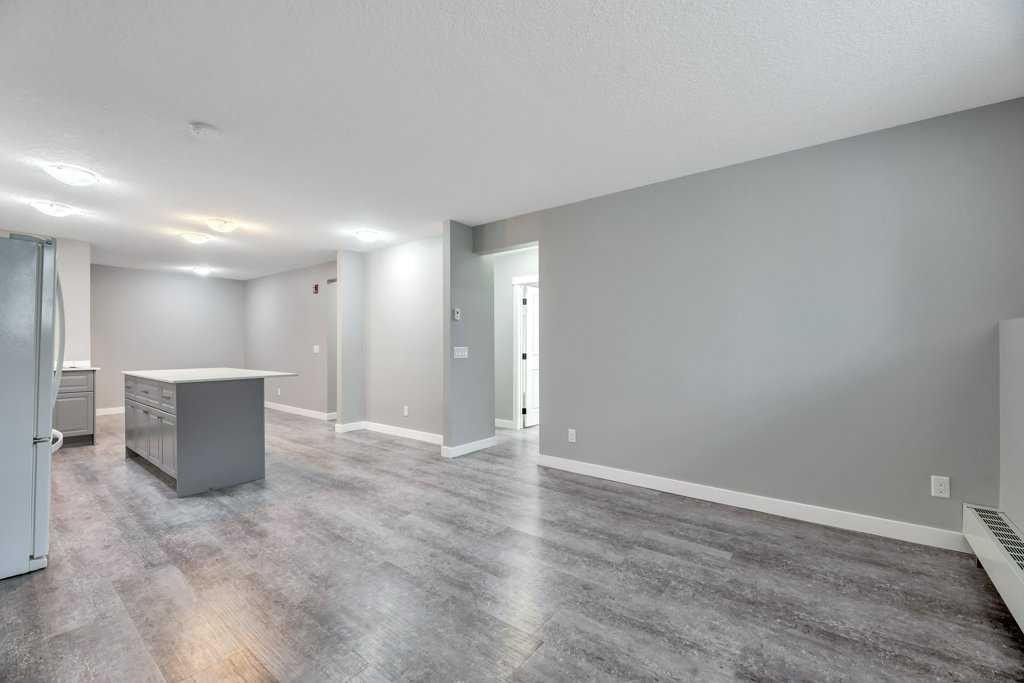 12-606 Lakeside Boulevard, Strathmore, AB - Indoor Photo Showing Other Room