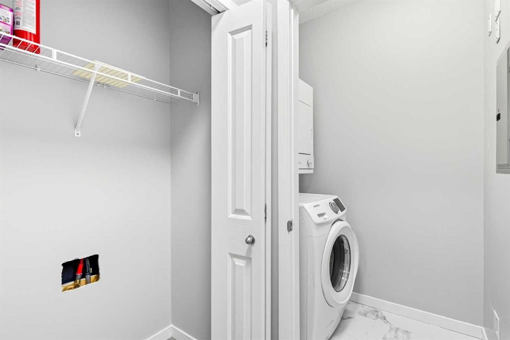 1414-1140 Taradale Drive Ne, Calgary, AB - Indoor Photo Showing Laundry Room
