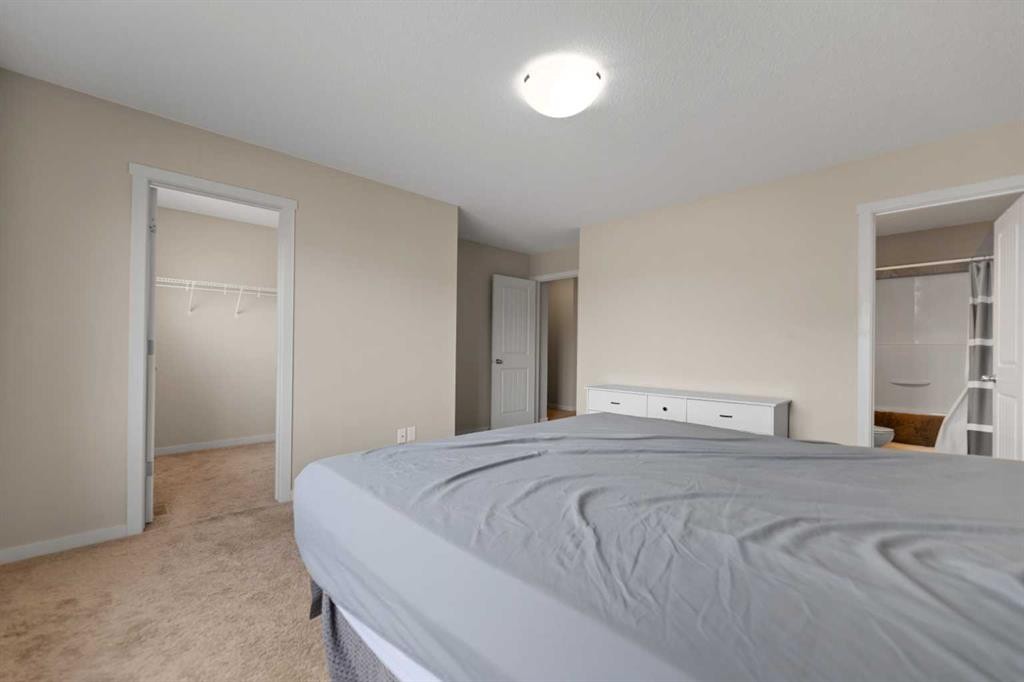 81 Copperpond Landing Se, Calgary, AB - Indoor Photo Showing Bedroom