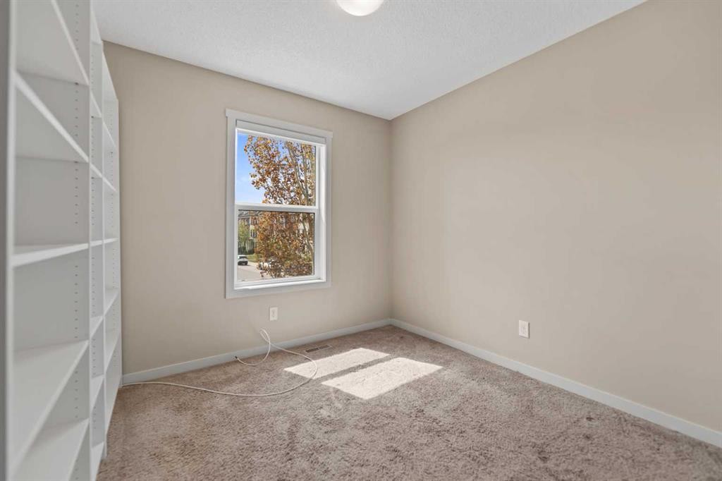 81 Copperpond Landing Se, Calgary, AB - Indoor Photo Showing Other Room