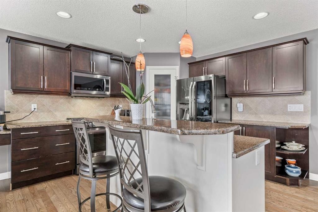 715 Copperpond Circle Se, Calgary, AB - Indoor Photo Showing Kitchen With Stainless Steel Kitchen With Upgraded Kitchen