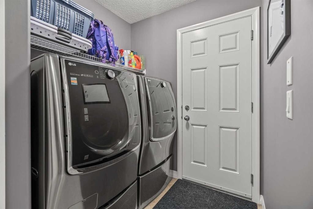 715 Copperpond Circle Se, Calgary, AB - Indoor Photo Showing Laundry Room