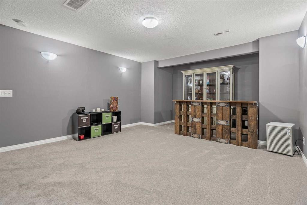 715 Copperpond Circle Se, Calgary, AB - Indoor Photo Showing Other Room