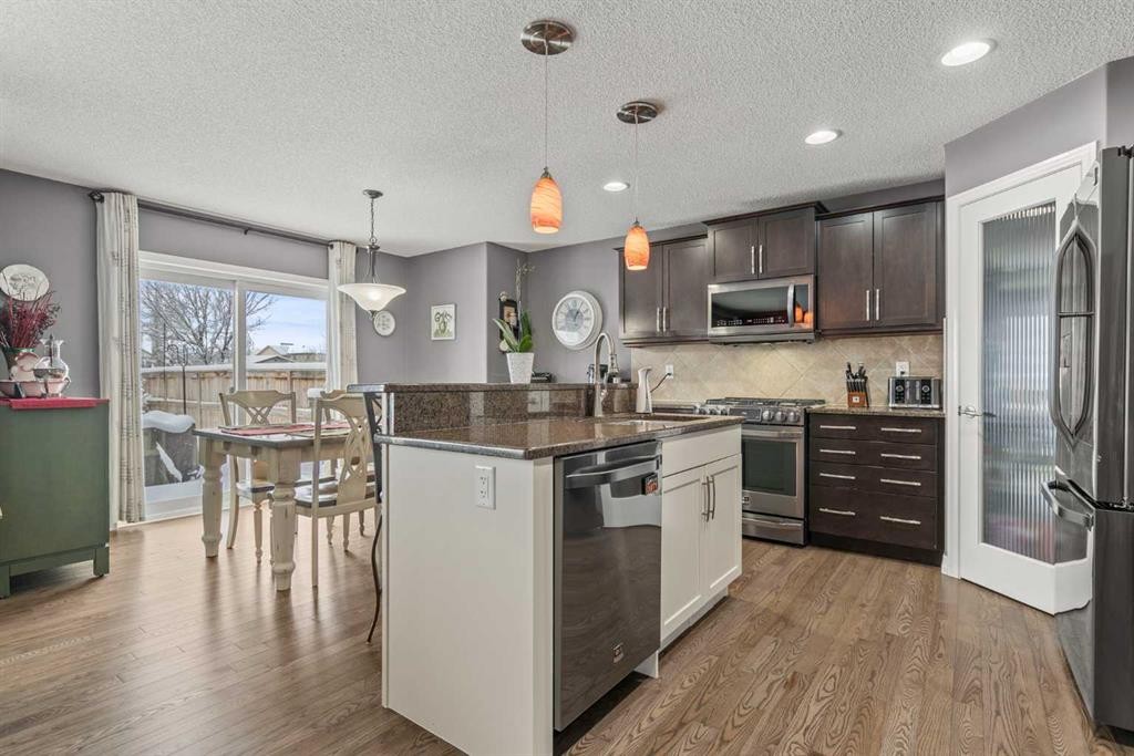 715 Copperpond Circle Se, Calgary, AB - Indoor Photo Showing Kitchen With Stainless Steel Kitchen With Upgraded Kitchen