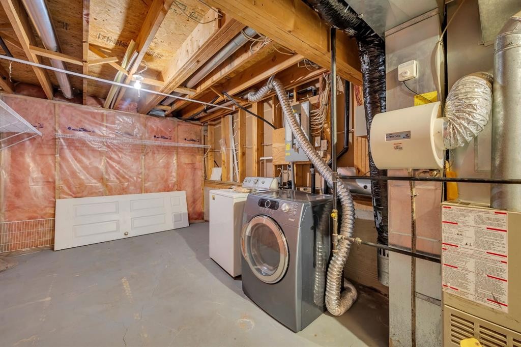 16218 Shawbrooke Road Sw, Calgary, AB - Indoor Photo Showing Laundry Room