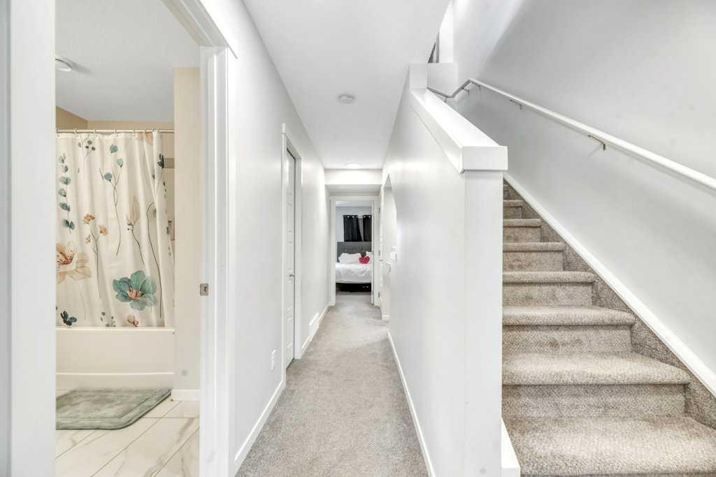 413-338 Seton Circle Se, Calgary, AB - Indoor Photo Showing Other Room