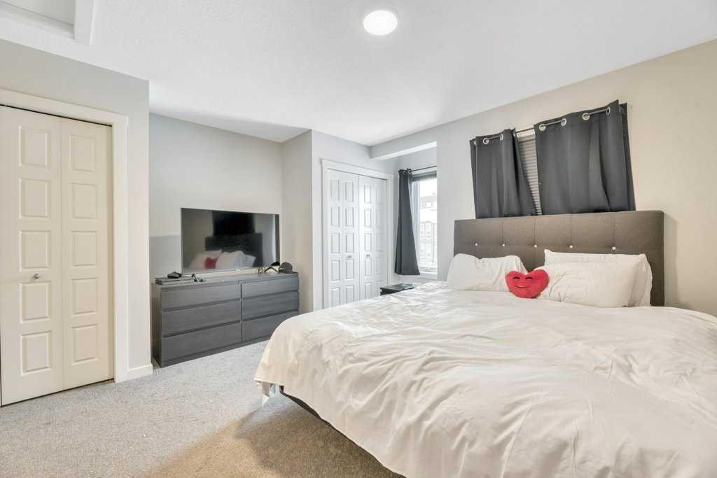 413-338 Seton Circle Se, Calgary, AB - Indoor Photo Showing Bedroom