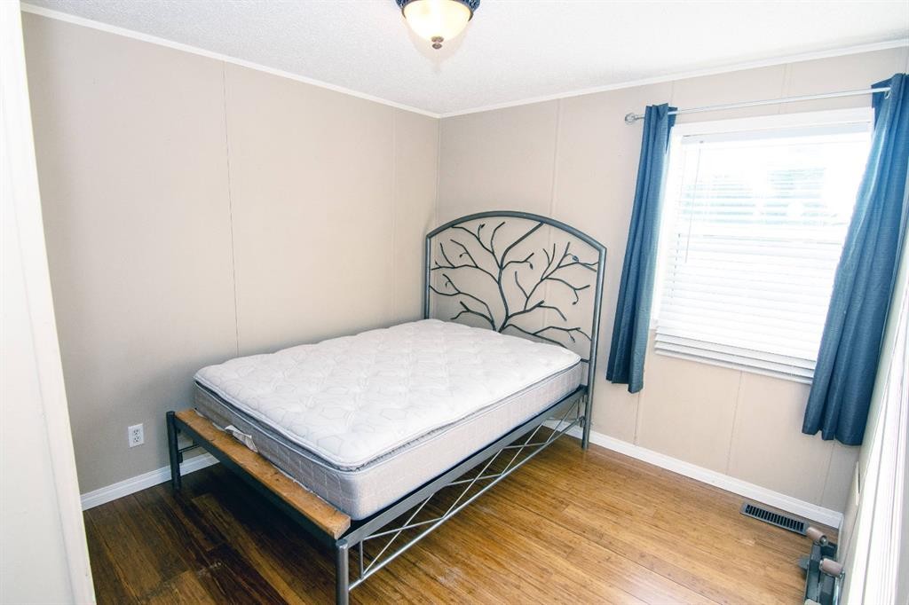 10 Westmount Drive, Cayley, AB - Indoor Photo Showing Bedroom
