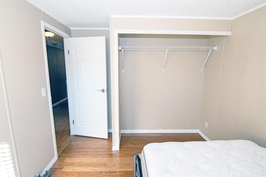 10 Westmount Drive, Cayley, AB - Indoor Photo Showing Bedroom