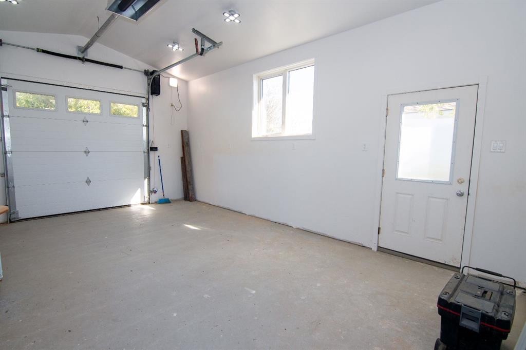 10 Westmount Drive, Cayley, AB - Indoor Photo Showing Garage