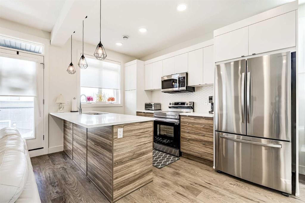511-10060 46 Street Ne, Calgary, AB - Indoor Photo Showing Kitchen With Upgraded Kitchen