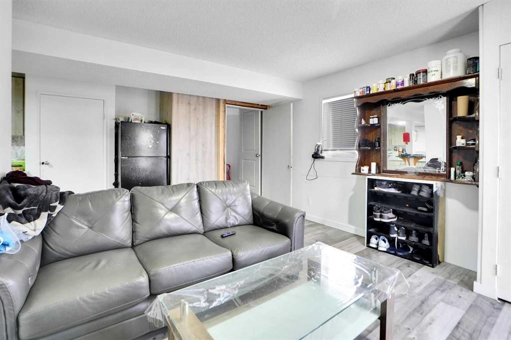 63 Martinbrook Road Ne, Calgary, AB - Indoor Photo Showing Living Room