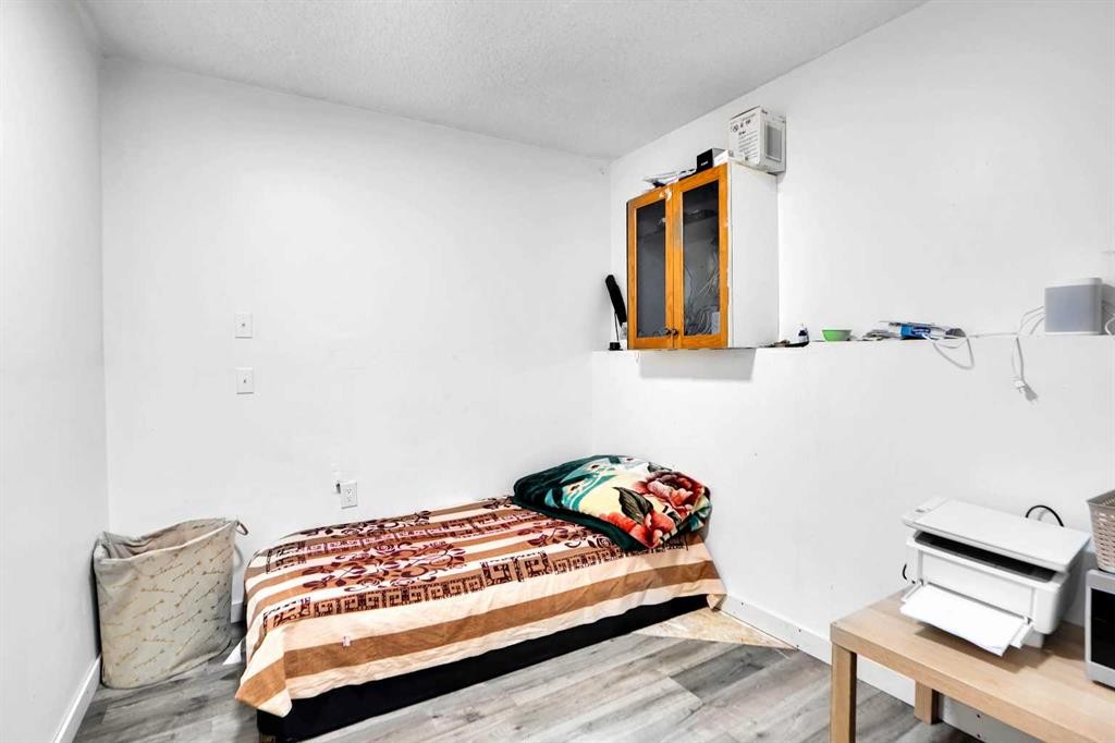 63 Martinbrook Road Ne, Calgary, AB - Indoor Photo Showing Bedroom