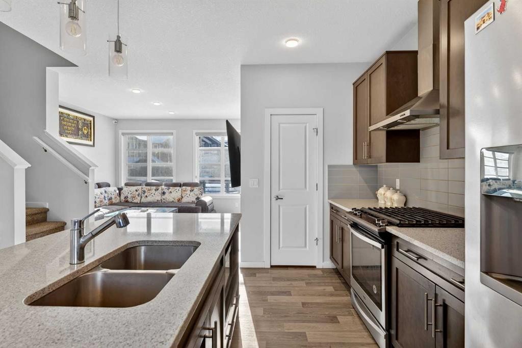 18 Savanna Drive Ne, Calgary, AB - Indoor Photo Showing Kitchen With Double Sink With Upgraded Kitchen