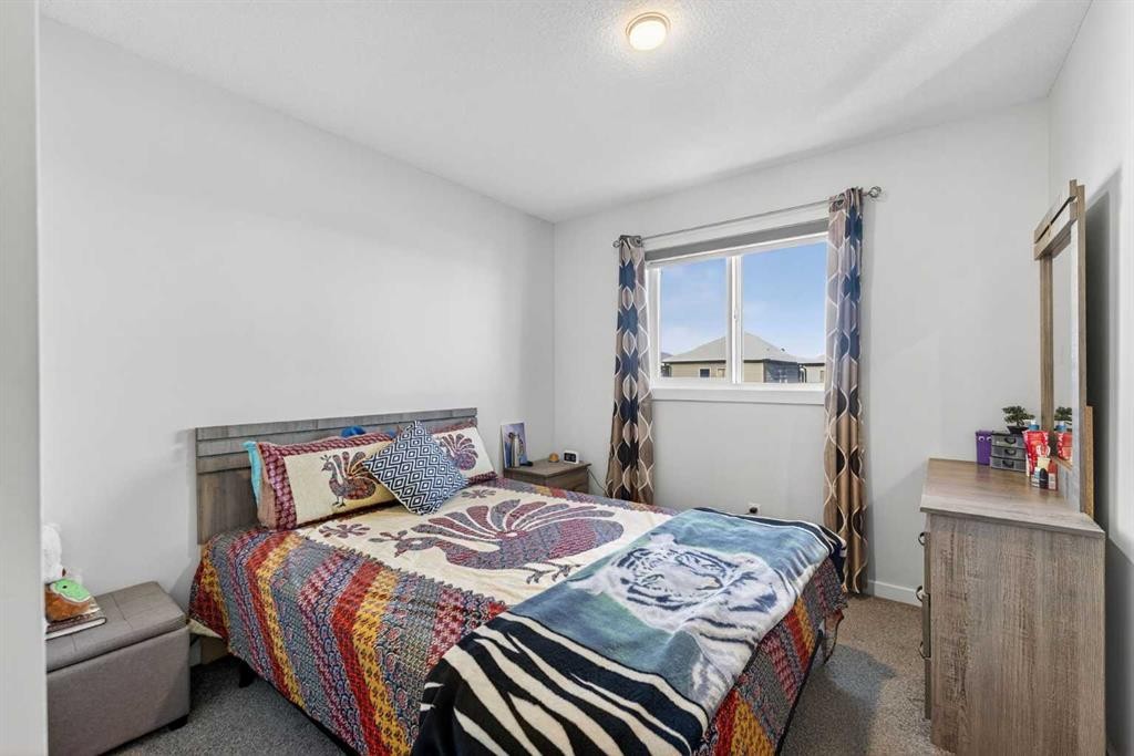 18 Savanna Drive Ne, Calgary, AB - Indoor Photo Showing Bedroom