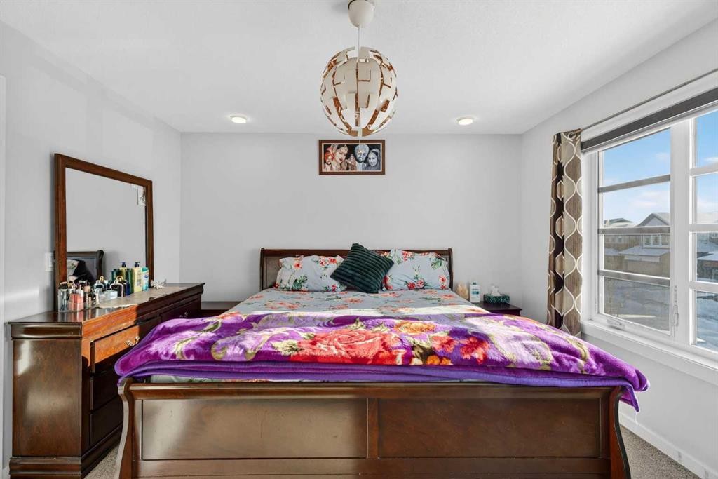 18 Savanna Drive Ne, Calgary, AB - Indoor Photo Showing Bedroom