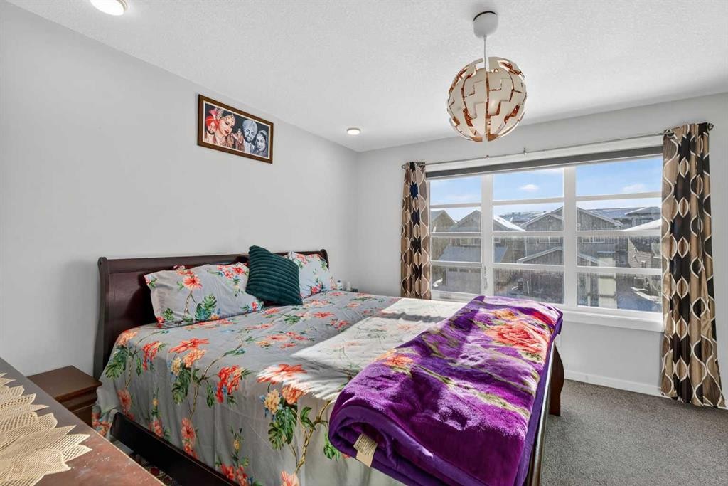 18 Savanna Drive Ne, Calgary, AB - Indoor Photo Showing Bedroom