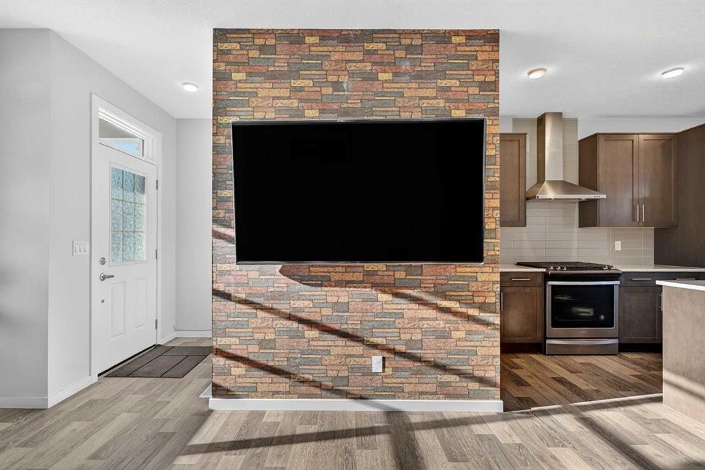 18 Savanna Drive Ne, Calgary, AB - Indoor With Fireplace