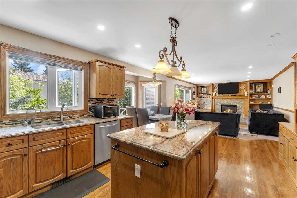 33 Edgevalley Way Nw, Calgary, AB - Indoor Photo Showing Kitchen With Fireplace