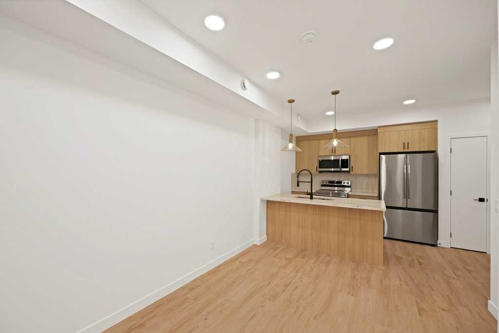 572 Seton Circle, Calgary, AB - Indoor Photo Showing Kitchen With Stainless Steel Kitchen