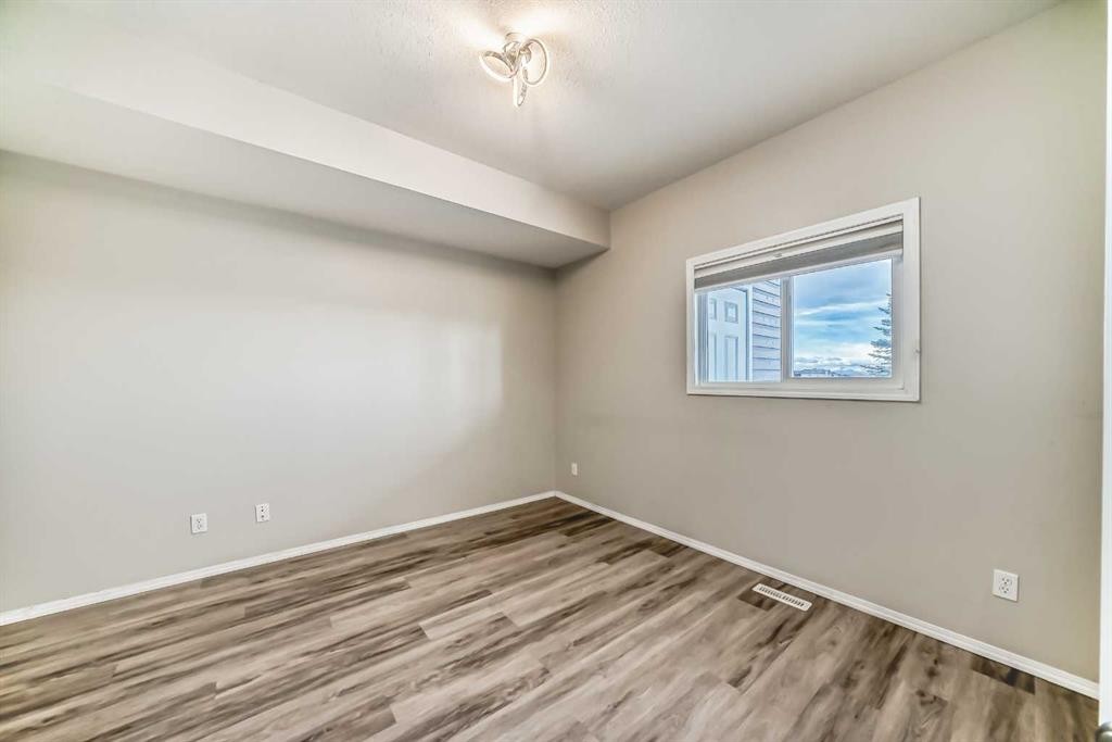 415 Sunrise Terrace Ne, High River, AB - Indoor Photo Showing Other Room