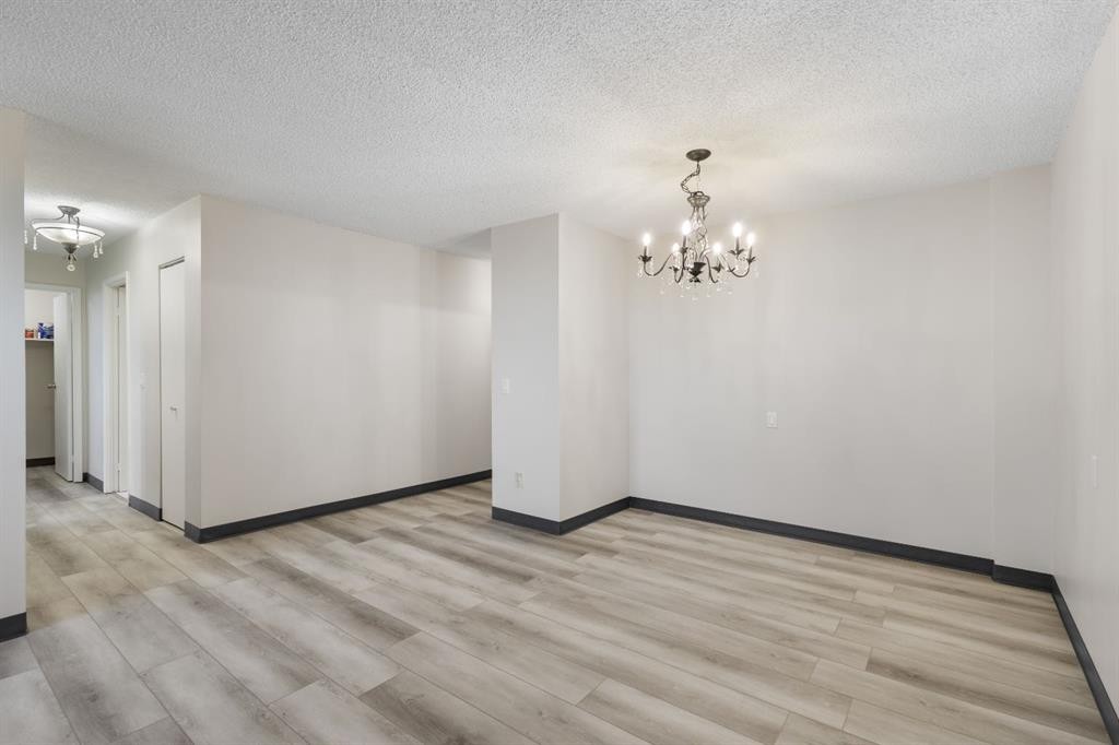 704-4944 Dalton Drive Nw, Calgary, AB - Indoor Photo Showing Other Room