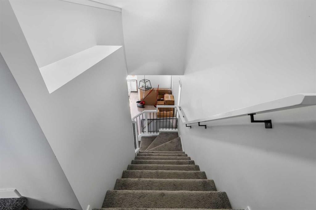 15 Edith Passage Nw, Calgary, AB - Indoor Photo Showing Other Room