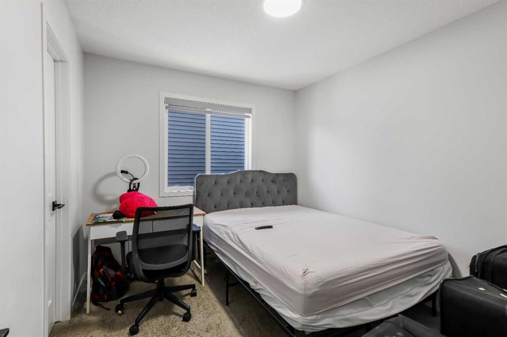 15 Edith Passage Nw, Calgary, AB - Indoor Photo Showing Other Room