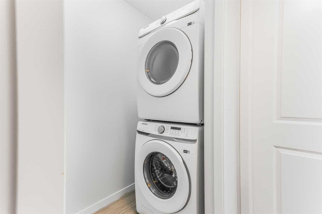 15 Edith Passage Nw, Calgary, AB - Indoor Photo Showing Laundry Room