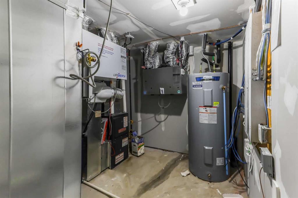 15 Edith Passage Nw, Calgary, AB - Indoor Photo Showing Basement