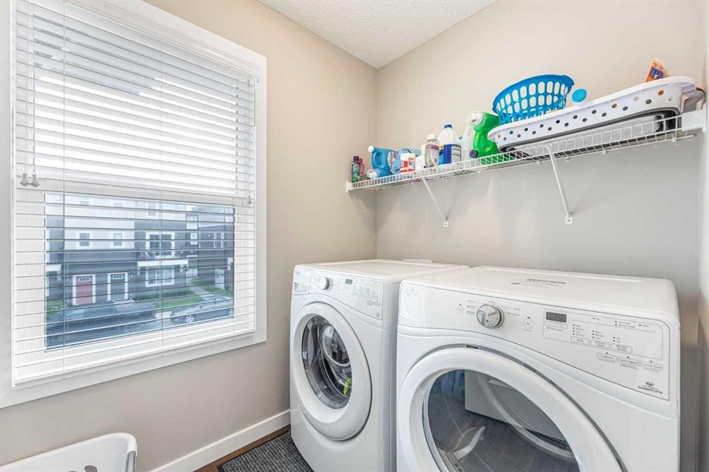 25 Cornerstone Manor Ne, Calgary, AB - Indoor Photo Showing Laundry Room