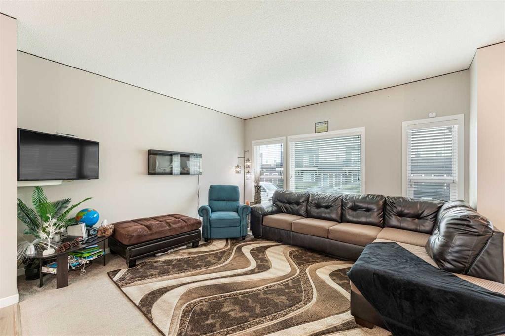 25 Cornerstone Manor Ne, Calgary, AB - Indoor Photo Showing Living Room