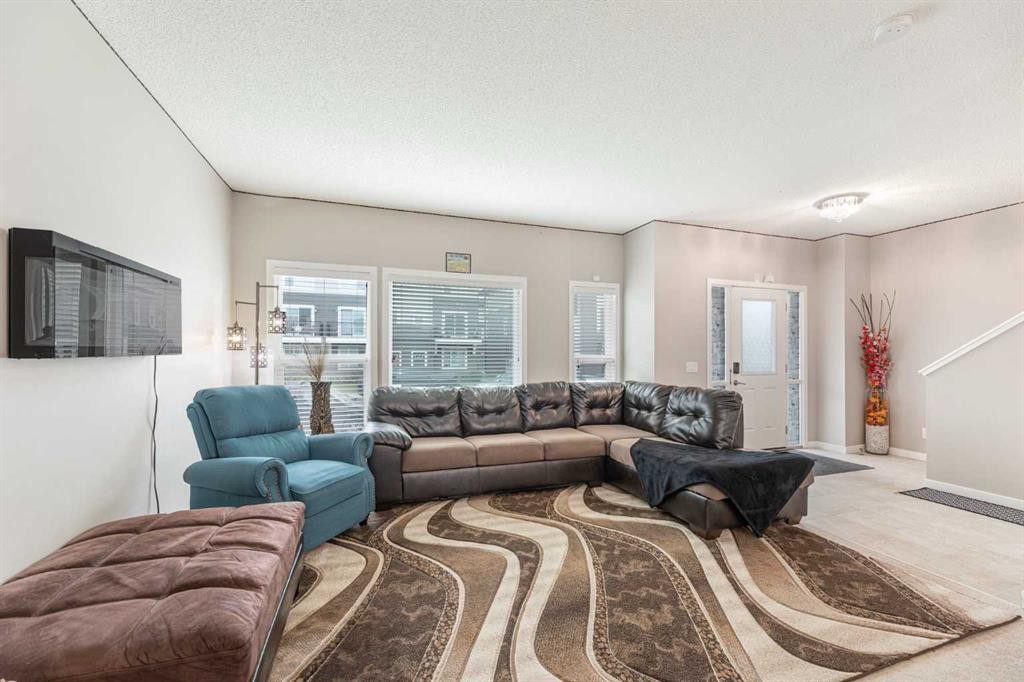 25 Cornerstone Manor Ne, Calgary, AB - Indoor Photo Showing Living Room