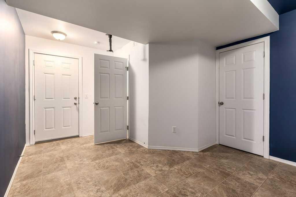 1102 Prairie Sound Circle Nw, High River, AB - Indoor Photo Showing Other Room