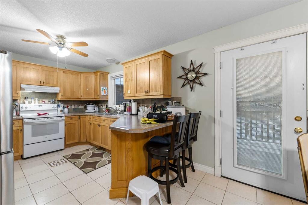 541 Highwood Drive, Longview, AB - Indoor Photo Showing Kitchen With Double Sink