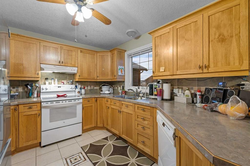 541 Highwood Drive, Longview, AB - Indoor Photo Showing Kitchen With Double Sink