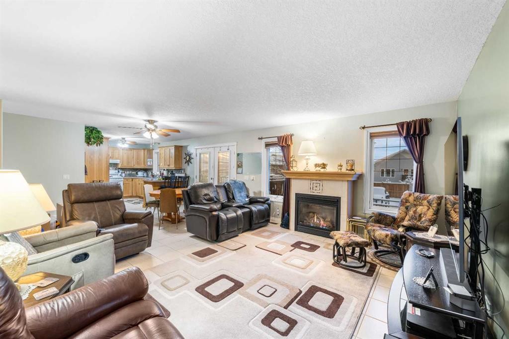 541 Highwood Drive, Longview, AB - Indoor Photo Showing Living Room With Fireplace