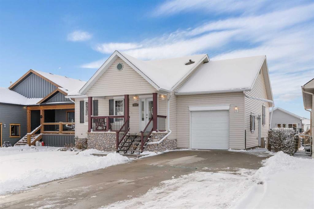 541 Highwood Drive, Longview, AB - Outdoor With Facade