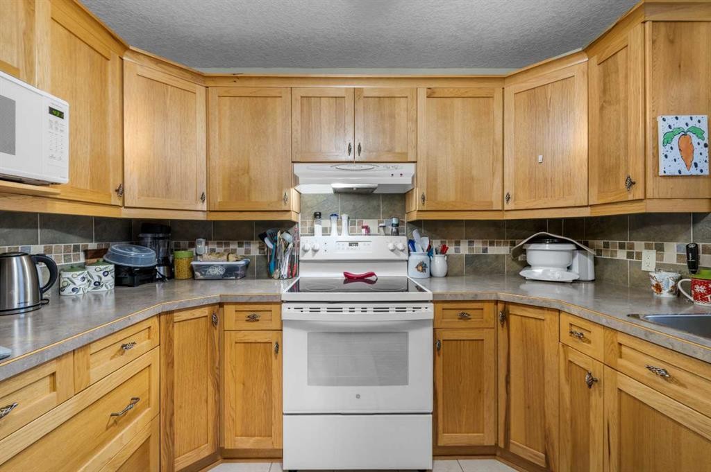 541 Highwood Drive, Longview, AB - Indoor Photo Showing Kitchen