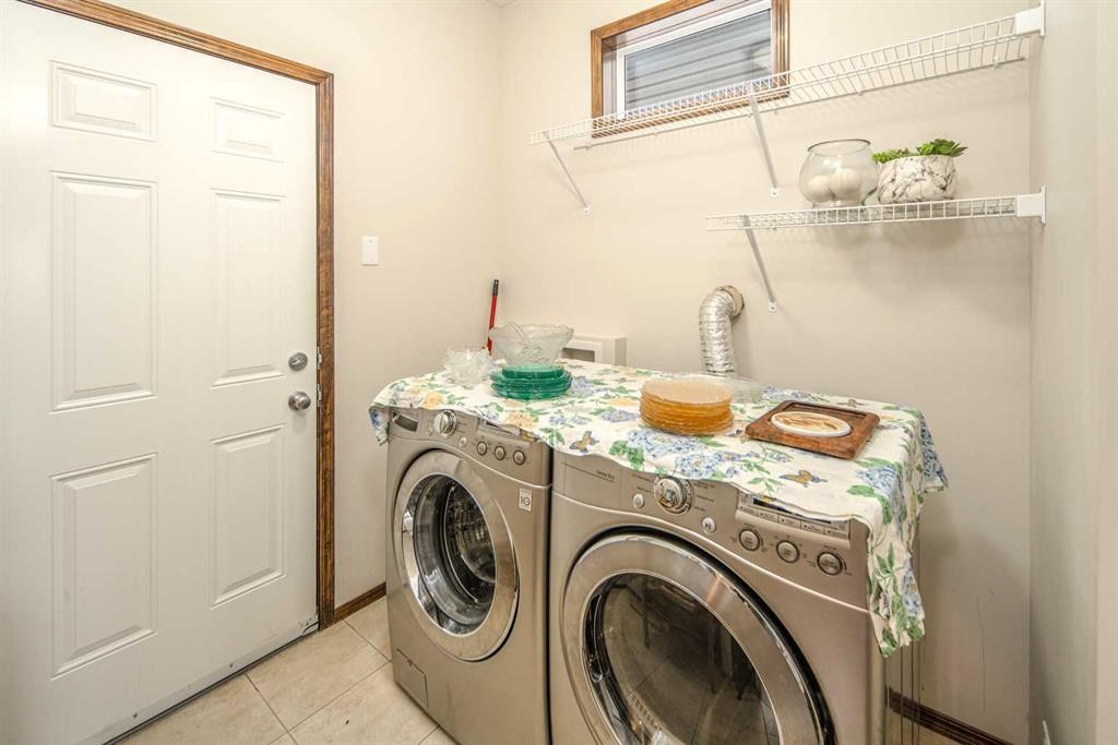 164 Everbrook Drive Sw, Calgary, AB - Indoor Photo Showing Laundry Room