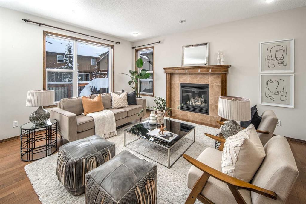 164 Everbrook Drive Sw, Calgary, AB - Indoor Photo Showing Living Room With Fireplace
