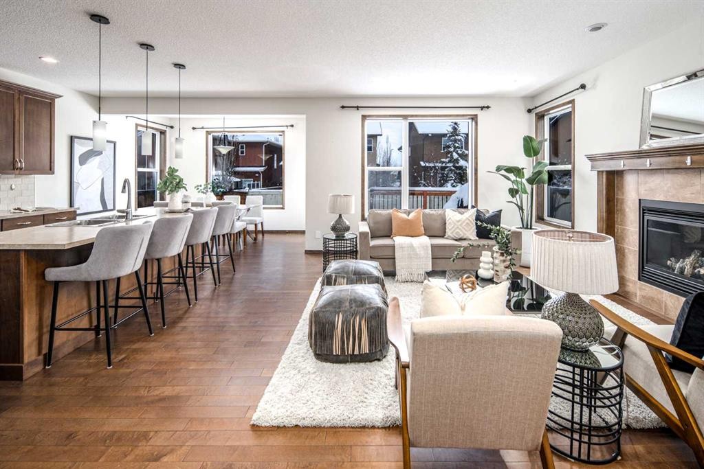 164 Everbrook Drive Sw, Calgary, AB - Indoor Photo Showing Living Room With Fireplace