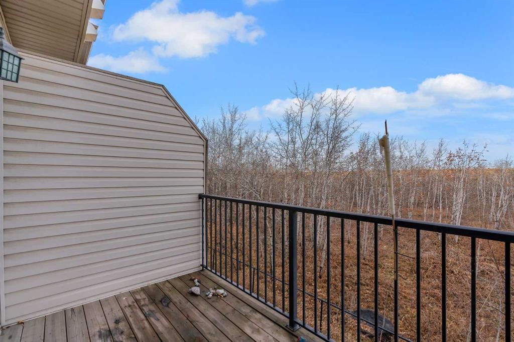 34 New Brighton Point Se, Calgary, AB - Outdoor With Balcony With Exterior