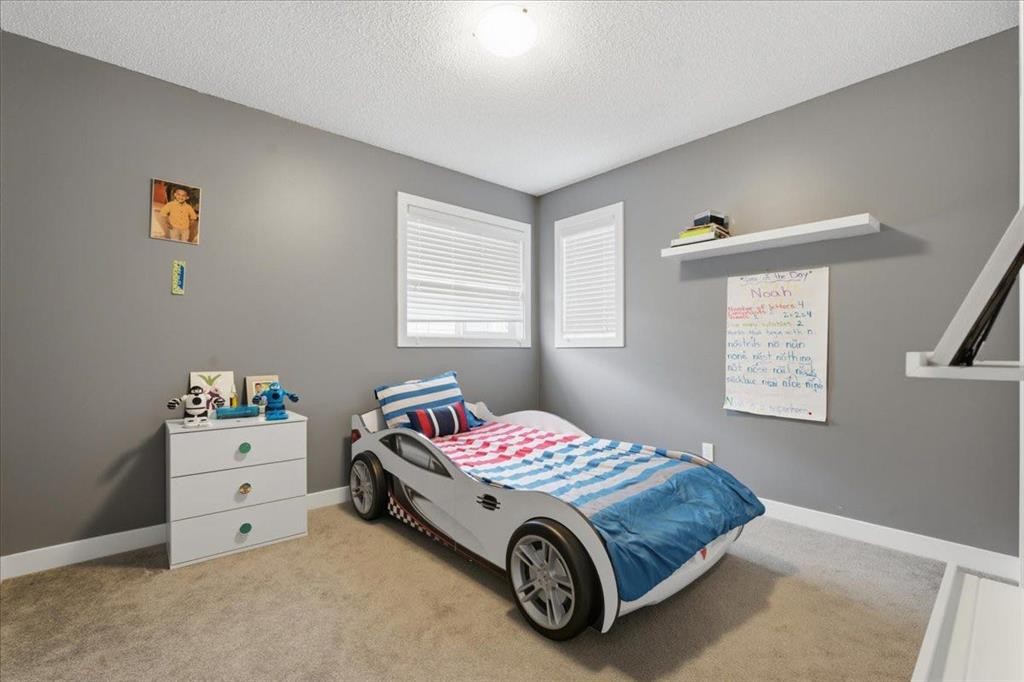 52 Brightoncrest Terrace Se, Calgary, AB - Indoor Photo Showing Bedroom